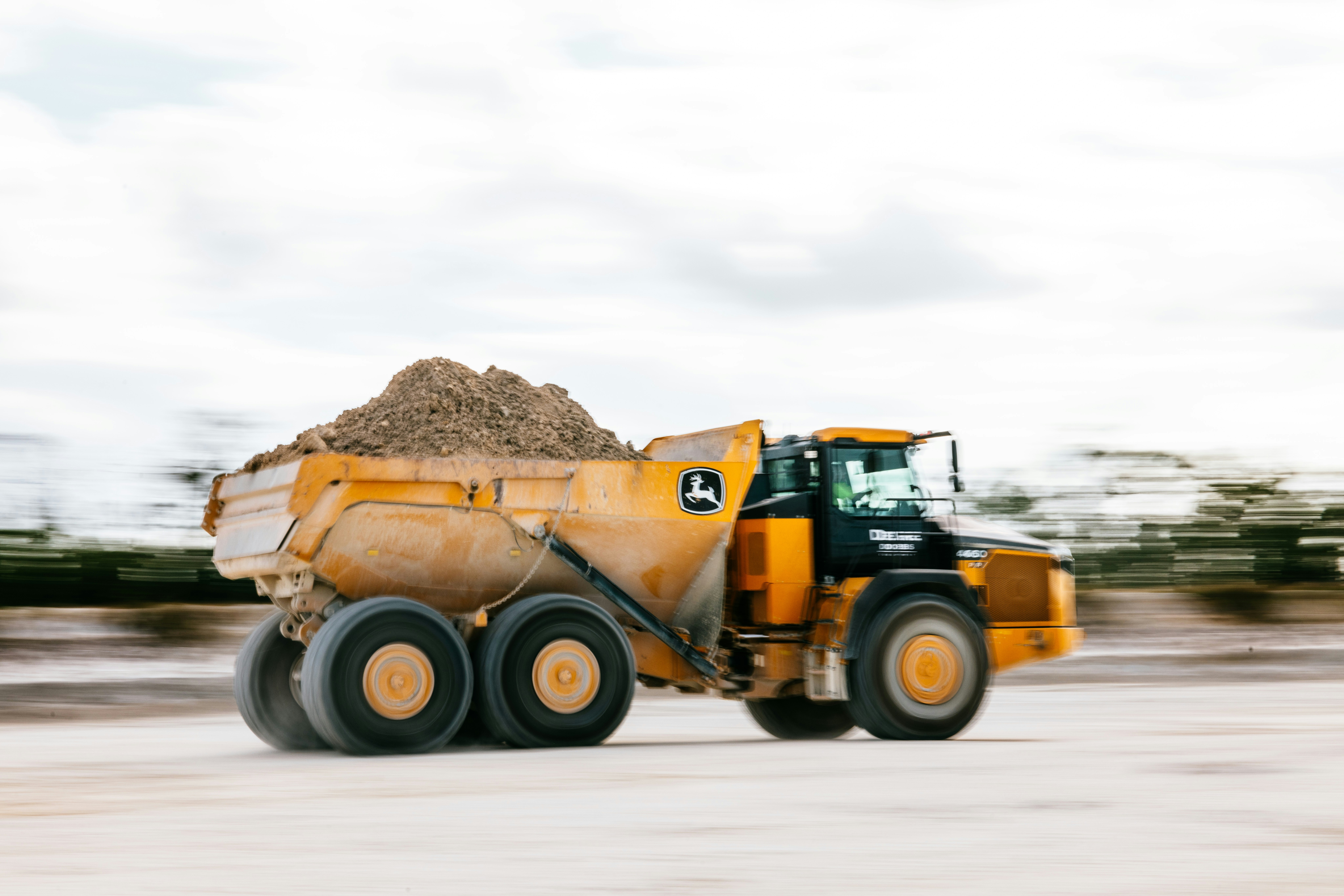 Mining excavator and dump truck operation